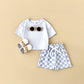 Ensemble deux pièces pantalon à carreaux et motif damier pour enfant