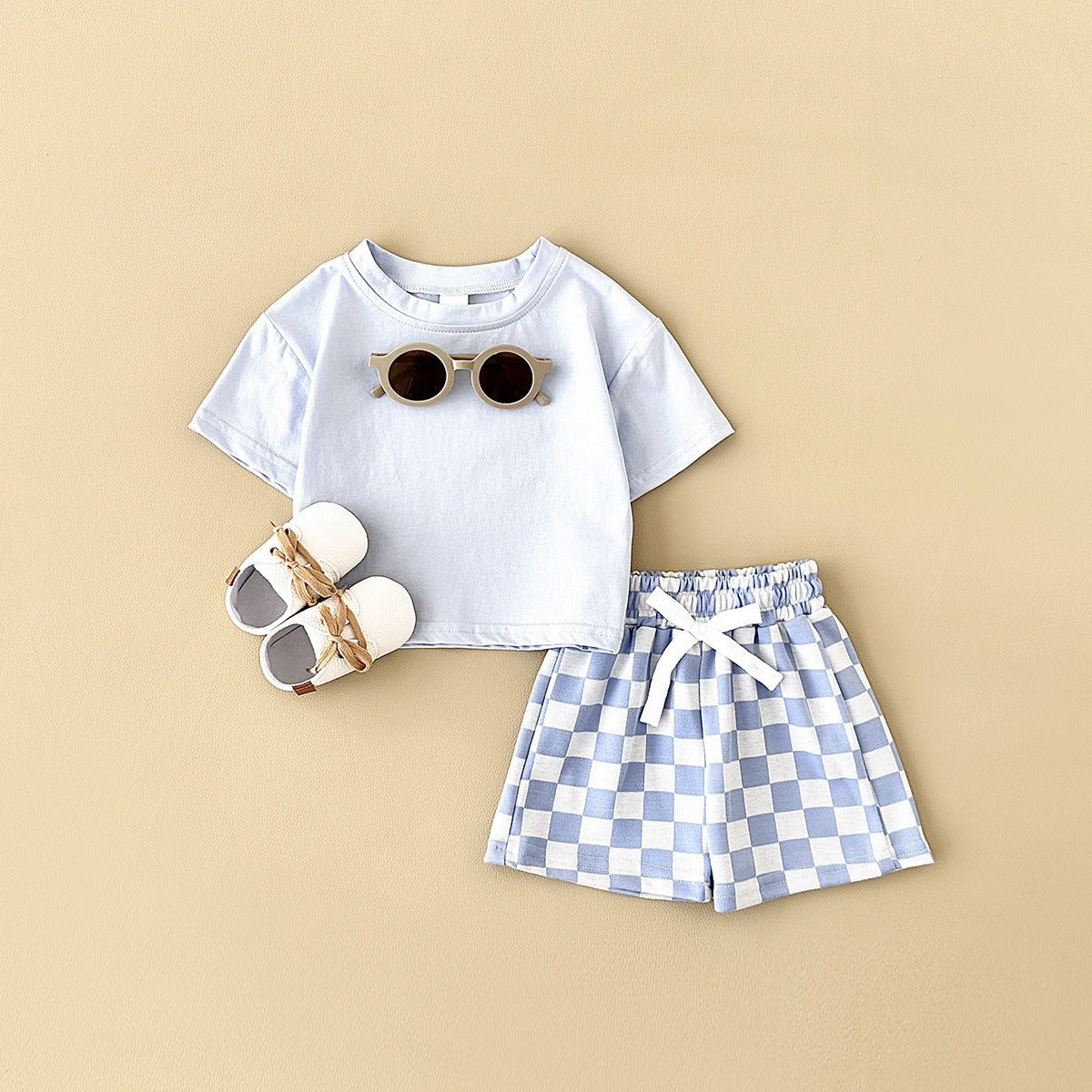 Ensemble deux pièces pantalon à carreaux et motif damier pour enfant