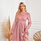 Robe trapèze à manches longues et col rond avec poche