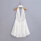 Robe à col suspendu brodé creux, jupe dos nu
