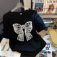 Nouveau t-shirt à manches courtes imprimé nœud papillon pour femme
