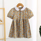 Robe mi-longue à fleurs et manches courtes pour fille