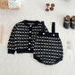 Combinaison en tricot style classique avec bretelles et manteau