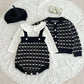 Combinaison en tricot style classique avec bretelles et manteau