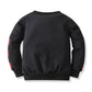 Pull deux pièces à manches longues avec coutures rouges et noires et pantalon tendance
