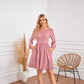 Robe trapèze à manches longues et col rond avec poche
