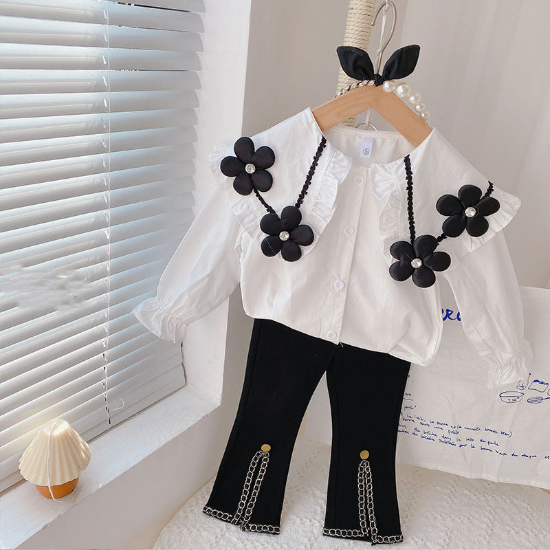 Ensemble deux pièces chemise à grandes fleurs et pantalon patte d'éléphant