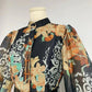 Robe à manches bouffantes et col montant, style vintage australien