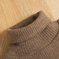 Ensemble deux pièces pull, chemise tricotée et jupe à carreaux