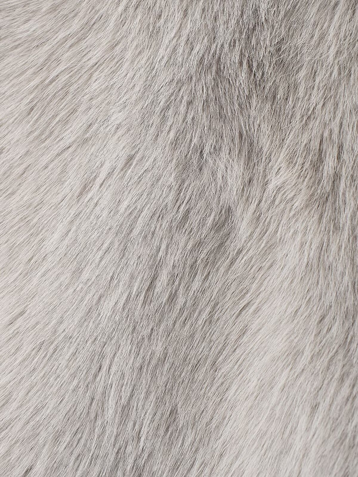 Manteau en fourrure de cuir simple et tendance pour femme