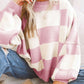 Pull à carreaux contrastés, style ample et décontracté, avec coutures