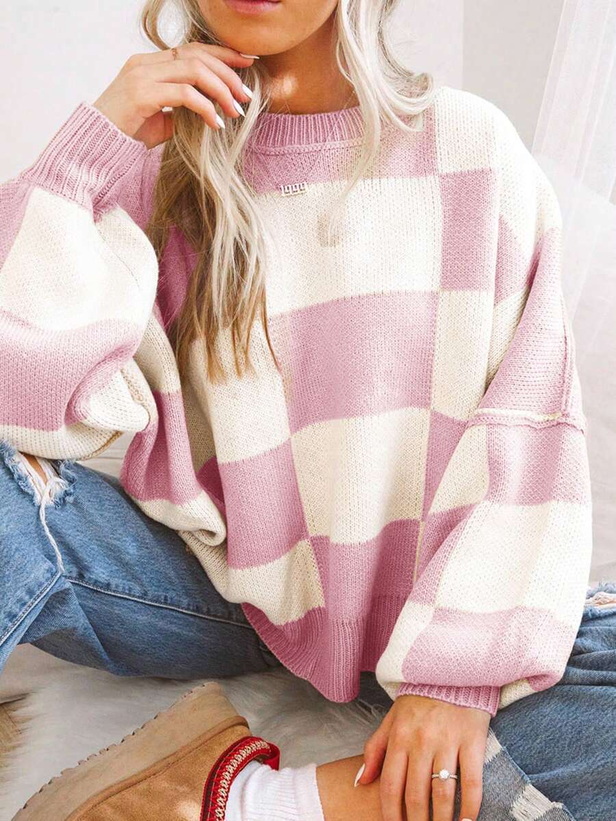 Pull à carreaux contrastés, style ample et décontracté, avec coutures