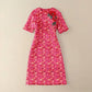 Robe mi-longue à carreaux et motifs jacquard tridimensionnels