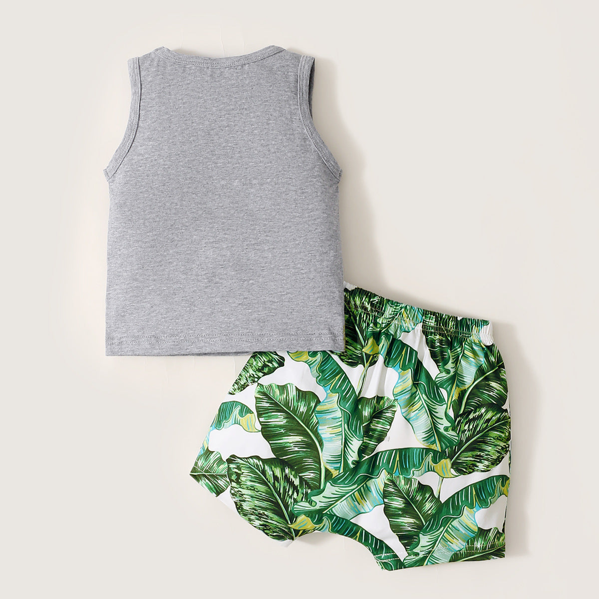 Ensemble deux pièces haut sans manches de couleur unie et short imprimé
