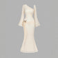 Flared Sleeves With A Butterfly-clasp Design Create A Slimming Ruched Look