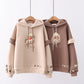 Pull à capuche ample et décontracté en peluche pour femme