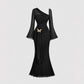 Flared Sleeves With A Butterfly-clasp Design Create A Slimming Ruched Look