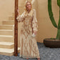 Robe brodée de paillettes dorée multicouches à manches volantées