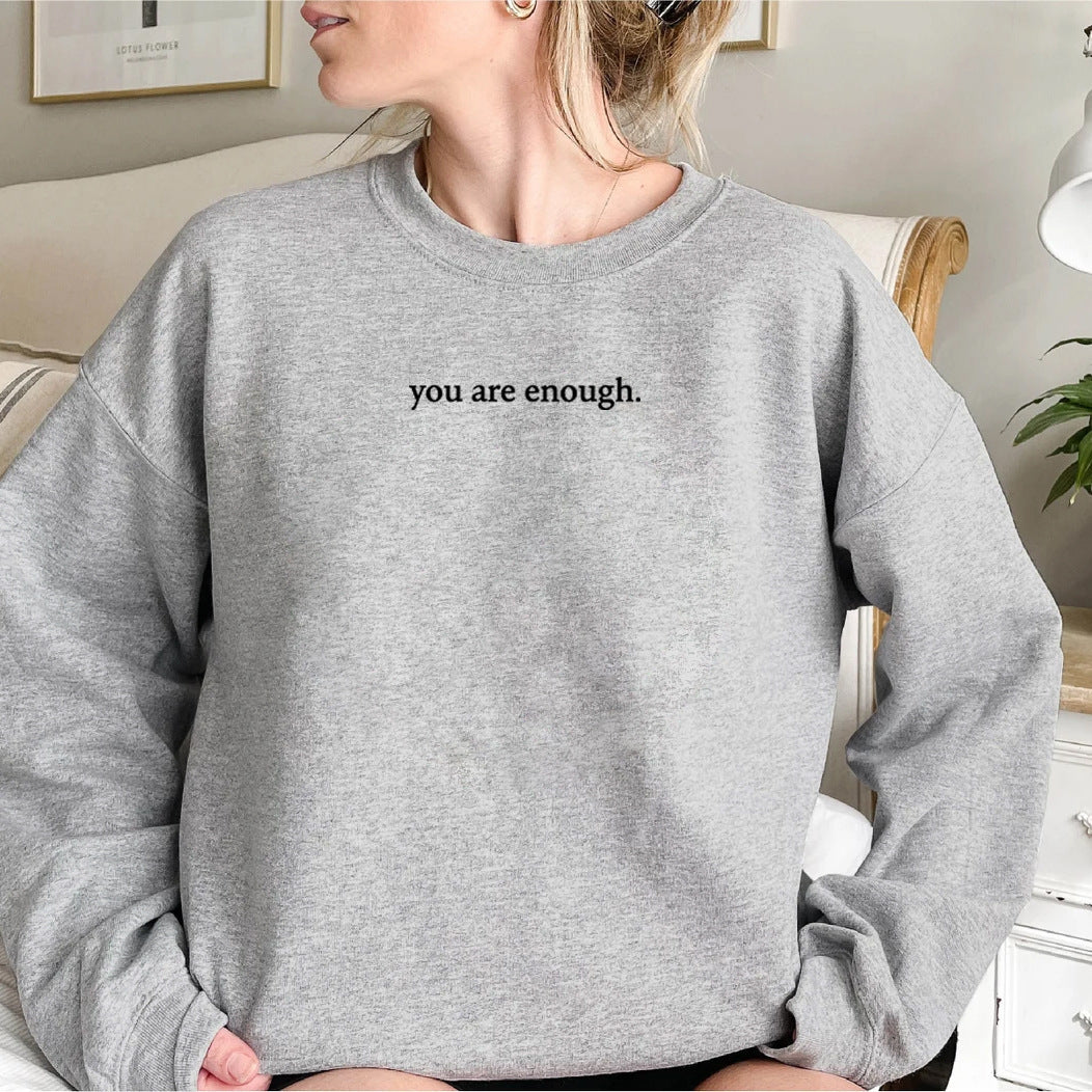 Pull ras du cou doublé polaire pour femme, imprimé slogan uni, simple et confortable, couleur unie