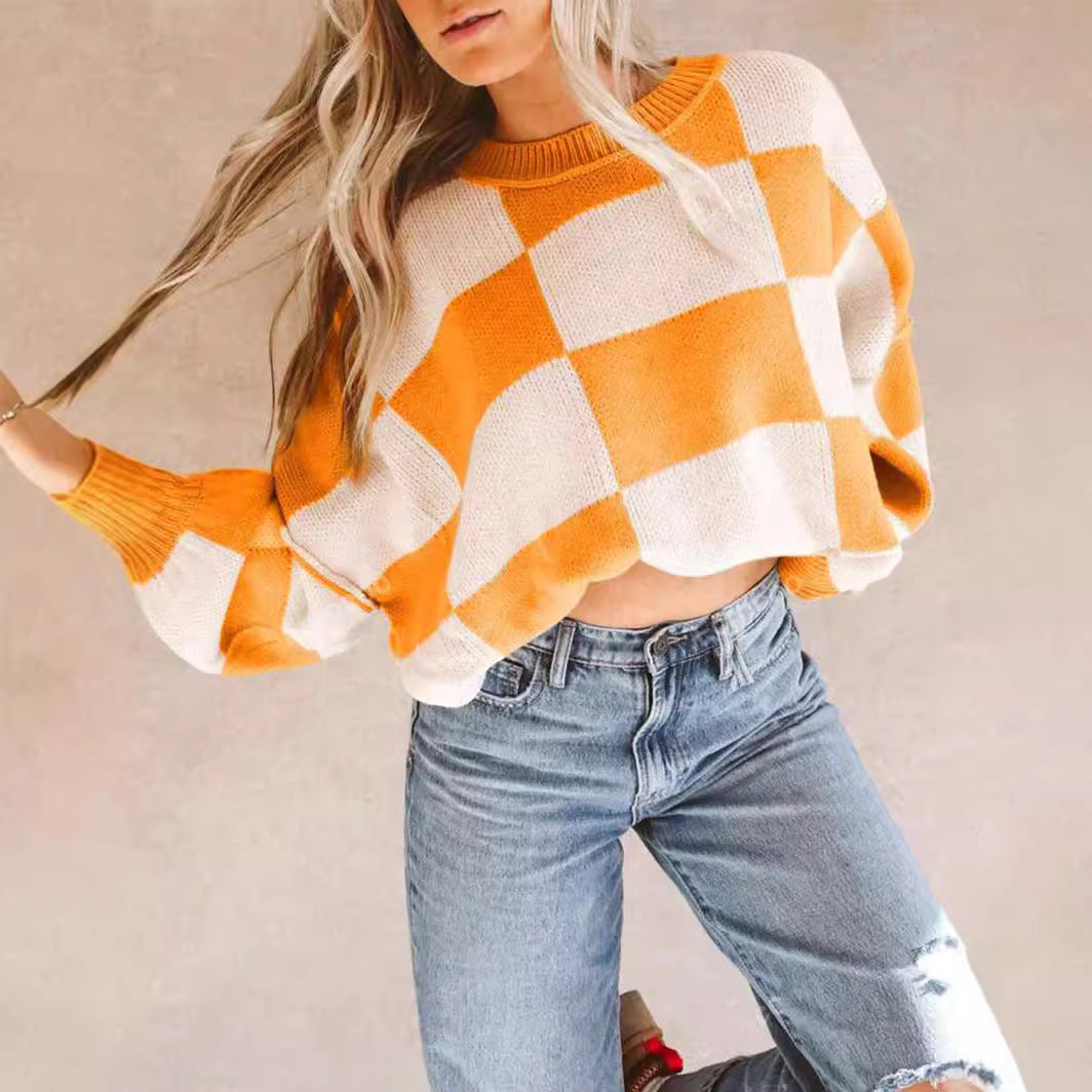 Pull à carreaux contrastés, style ample et décontracté, avec coutures