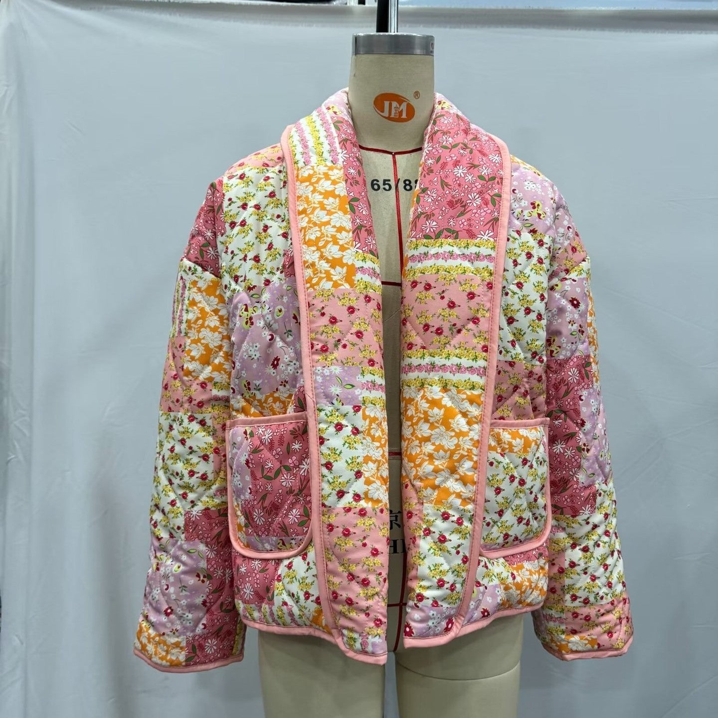 Manteau veste matelassée en coton à imprimé à revers