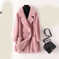 Manteau mi-long ample en laine de mouton pour femme