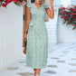 Robe fendue à lacets et manches évasées à volants