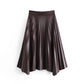 High Waist Pleated PU Leather Hem Irregular Skirt