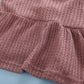 Ensemble deux pièces haut à bretelles sans manches et short de couleur unie