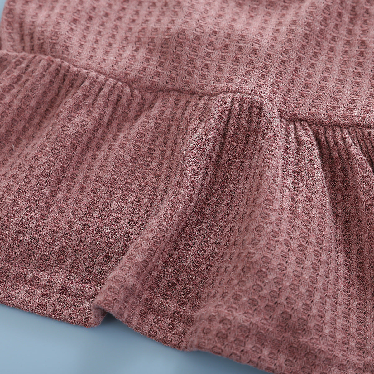 Ensemble deux pièces haut à bretelles sans manches et short de couleur unie