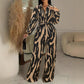 Womens Stylish Wide-leg Jumpsuit With Long Sleeves Floral Print And A Fitted Waist