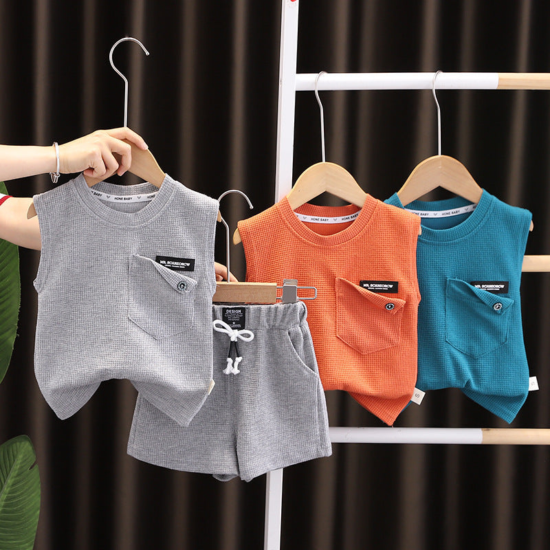 Gilet sans manches à poches de couleur unie pour garçon