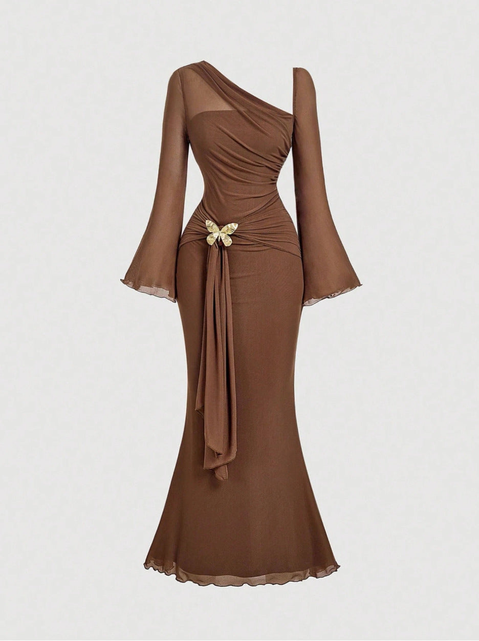 Flared Sleeves With A Butterfly-clasp Design Create A Slimming Ruched Look