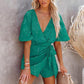 The New V-neck Leaky Back Printed Jumpsuit