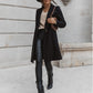 Manteau en laine mi-long à boutons et revers de couleur unie