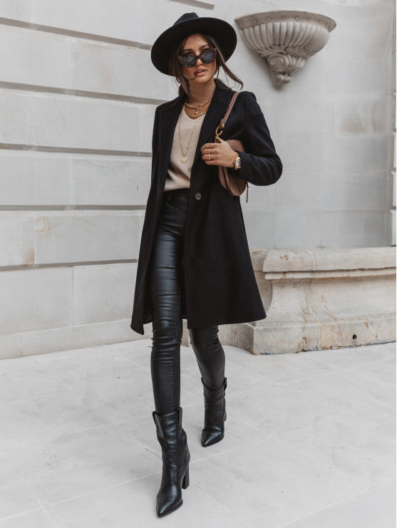 Manteau en laine mi-long à boutons et revers de couleur unie