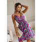 Robe d'été courte plissée à col en V et bretelles à imprimé floral pour femme