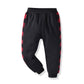 Pull deux pièces à manches longues avec coutures rouges et noires et pantalon tendance