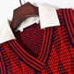 Pull taille haute à col en V croisé et losanges