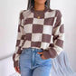Pull à carreaux contrastés, style ample et décontracté, avec coutures