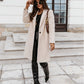 Manteau en laine mi-long à boutons et revers de couleur unie