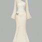 Flared Sleeves With A Butterfly-clasp Design Create A Slimming Ruched Look