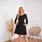 Robe trapèze à manches longues et col rond avec poche