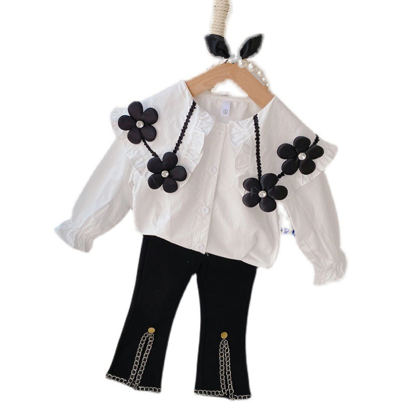 Ensemble deux pièces chemise à grandes fleurs et pantalon patte d'éléphant