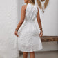 Elegant White Embroidered High-waisted Halter Dress With A Cinched Waist