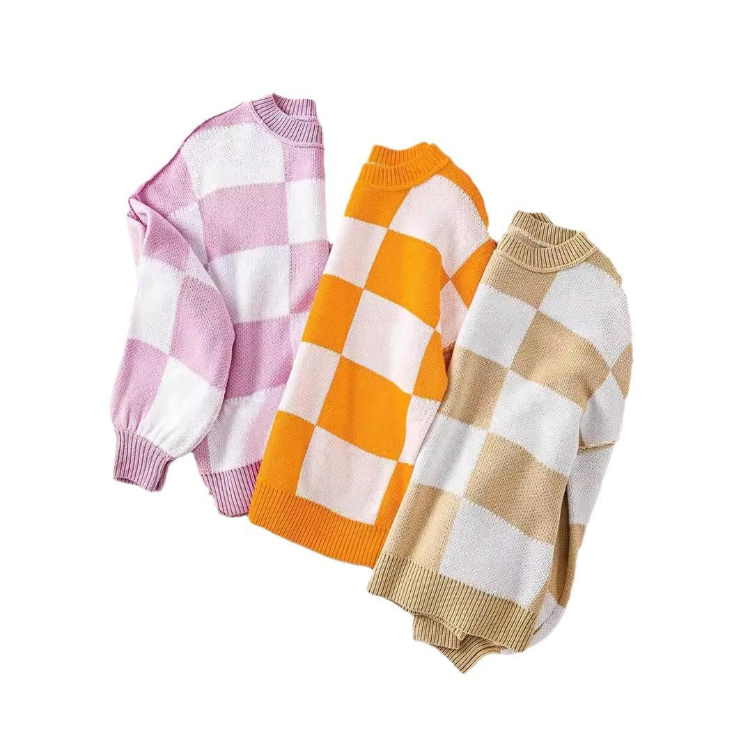 Pull à carreaux contrastés, style ample et décontracté, avec coutures
