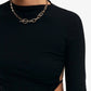 Crop top uni à nouer et dos nu avec ourlet incurvé