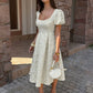 Elegant High-waisted A-line Dress With Puff Sleeves That Create A Slimming Elongating Look