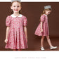 Robe mi-longue à fleurs et manches courtes pour fille